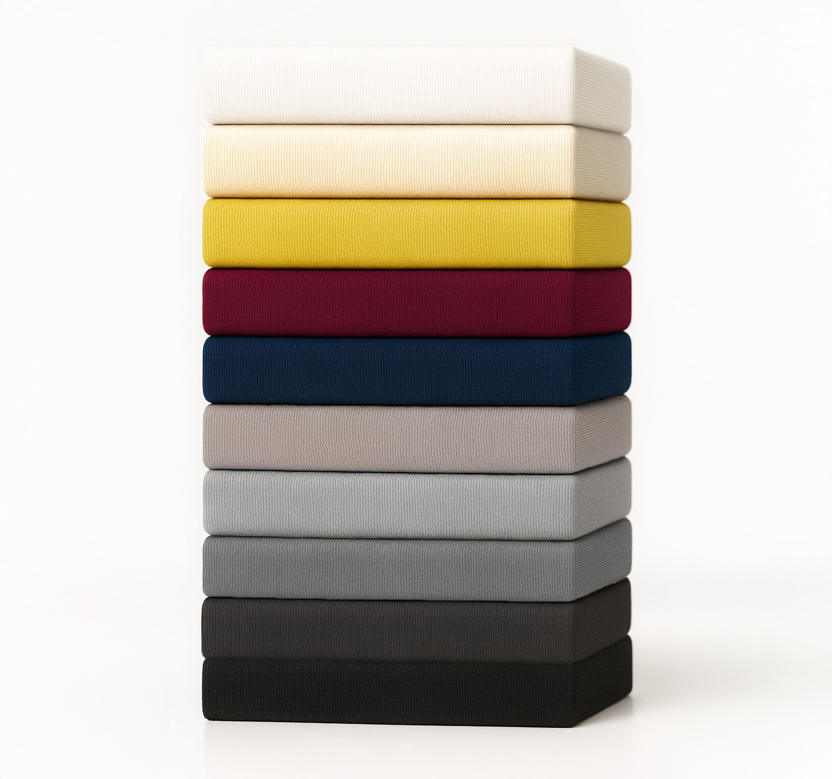 Stapel von zehn Spannbettlaken in verschiedenen Farben, aus Baumwolle, in verschiedenen Größen
