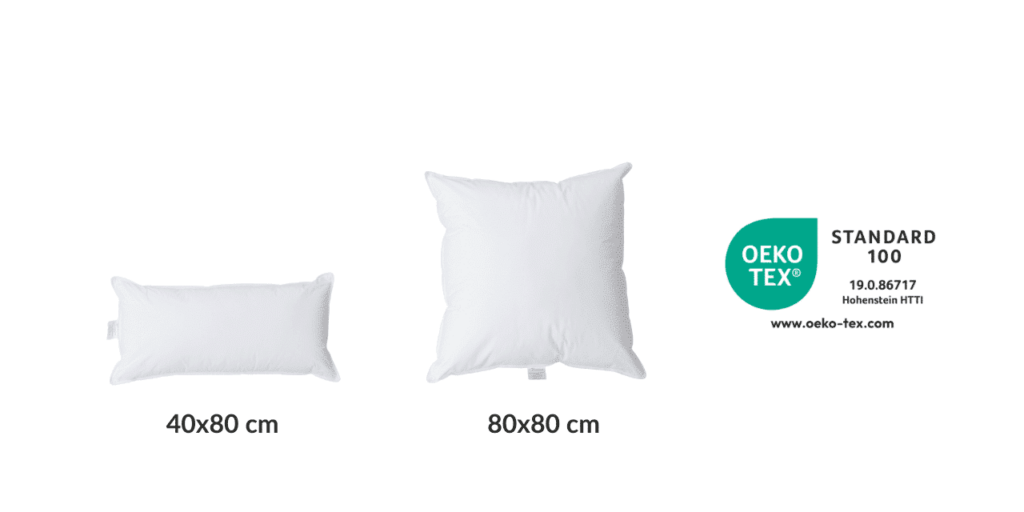 Zwei weiße Kissen in den Größen 40x80 cm und 80x80 cm, zertifiziert nach Oeko-Tex Standard 100.