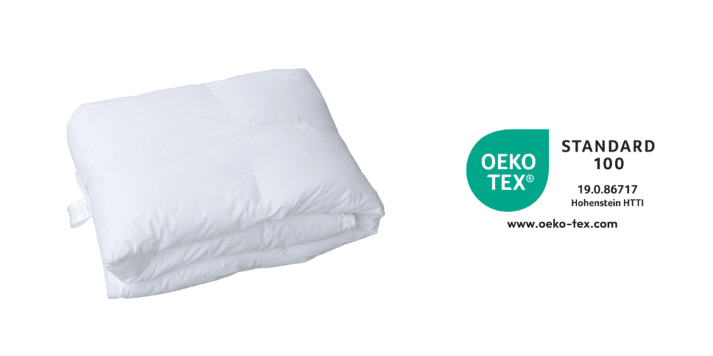 Weiße Dormigood Bettdecke, Oeko-Tex Standard 100, weich und atmungsaktiv, ideal für komfortablen Schlaf.